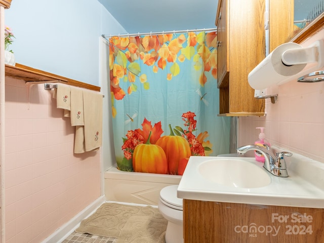 full bathroom featuring vanity, toilet, shower / tub combo, and tile patterned flooring