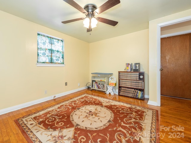 interior space featuring ceiling fan and hardwood / wood-style floors