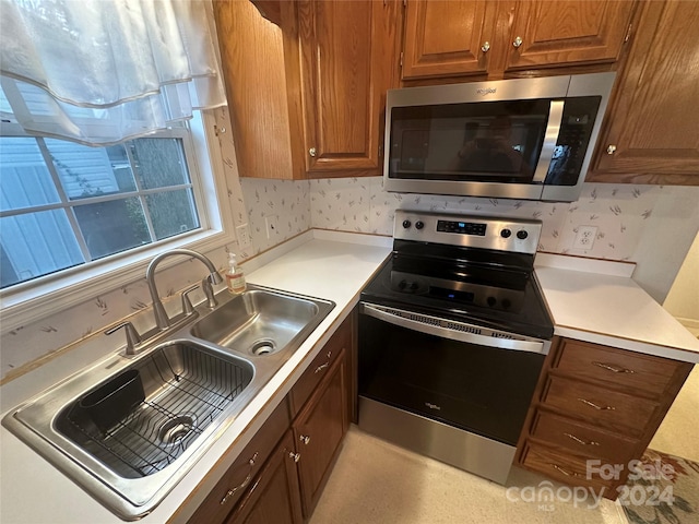 kitchen featuring sink and stainless steel appliances