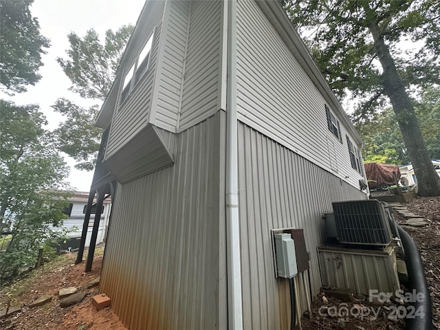 view of home's exterior featuring cooling unit