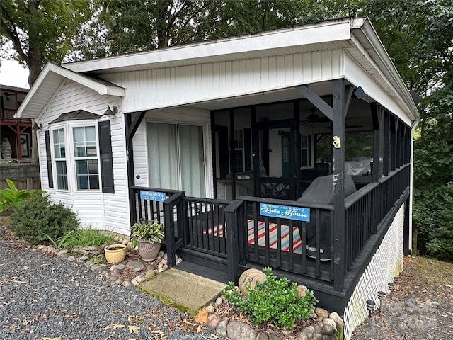 view of front facade with a sunroom