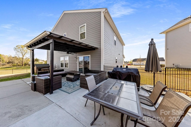 exterior space featuring grilling area and outdoor lounge area