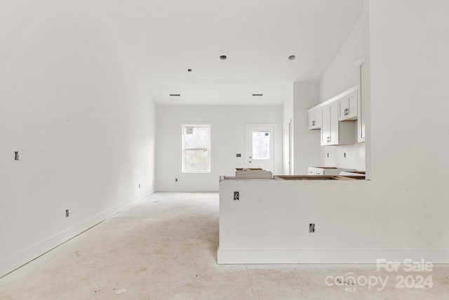 kitchen featuring white cabinetry