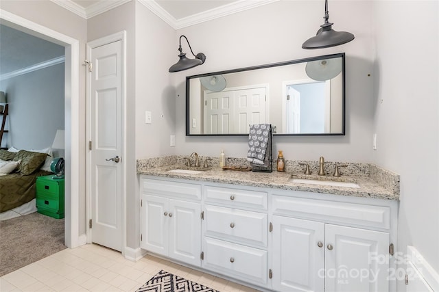 bathroom featuring vanity, tile patterned flooring, and ornamental molding