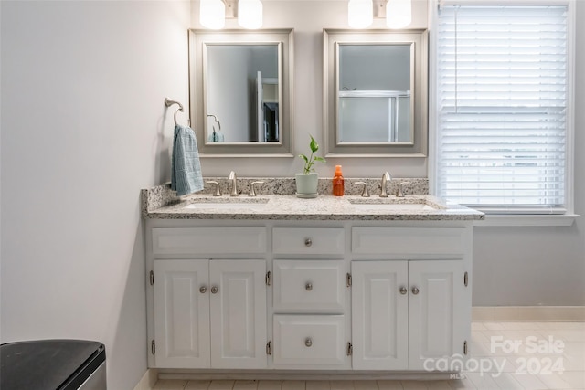 bathroom featuring vanity and tile patterned floors