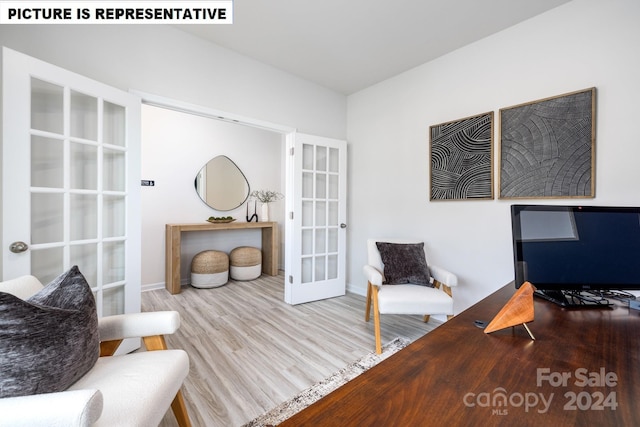 interior space featuring french doors and light hardwood / wood-style floors