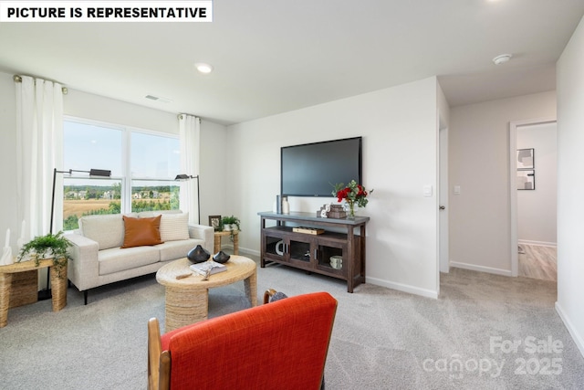 living room with baseboards, visible vents, carpet flooring, and recessed lighting