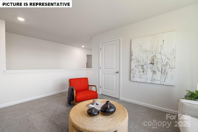 sitting room with carpet floors, recessed lighting, and baseboards