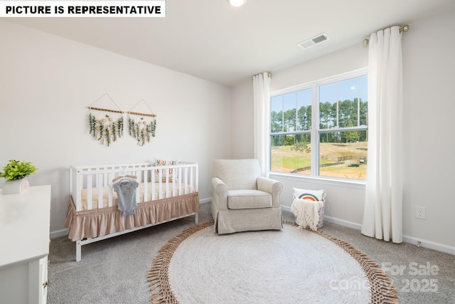 bedroom featuring a nursery area, carpet flooring, visible vents, and baseboards