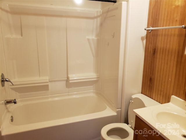 full bathroom featuring vanity, shower / bath combination, and toilet