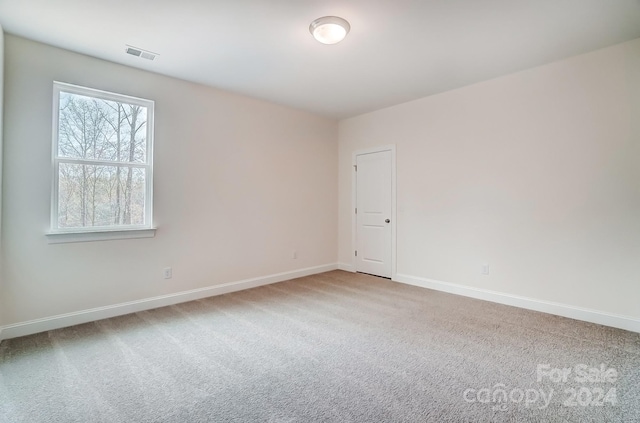 view of carpeted spare room