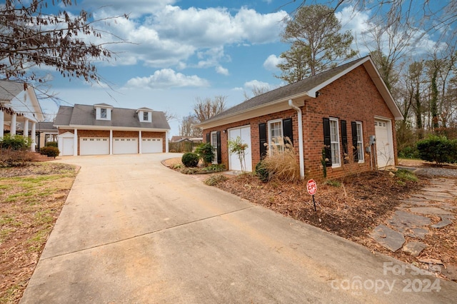 view of side of property featuring a garage