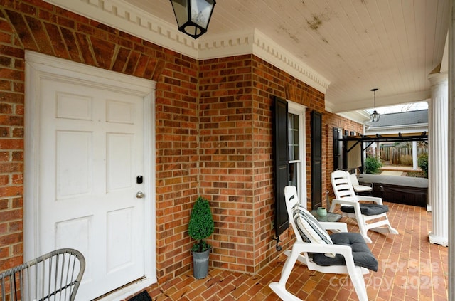 doorway to property with covered porch