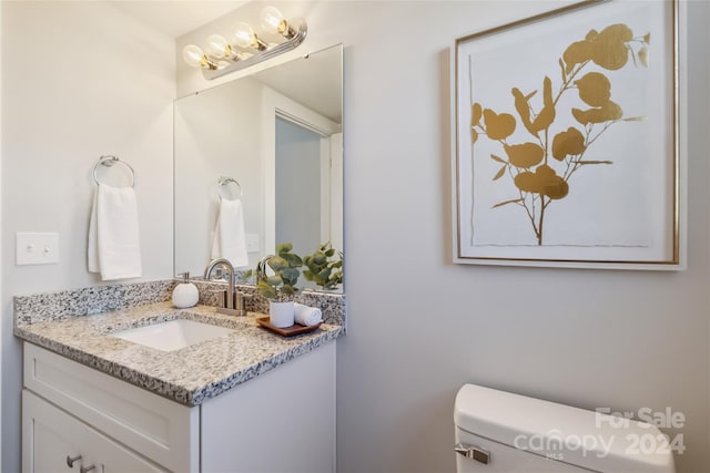 1038 Heath Helms Rd, Monroe, NC 28110 - half bath featuring vanity and toilet