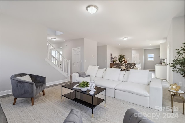 1038 Heath Helms Rd, Monroe, NC 28110 - living area featuring stairway, light wood-style flooring, and recessed lighting