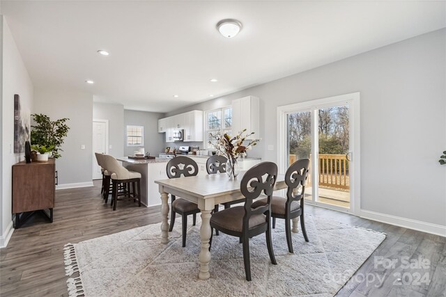 1038 Heath Helms Rd, Monroe, NC 28110 - dining area featuring wood finished floors and recessed lighting