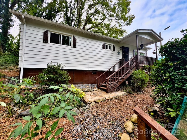 333 N Meridian St, Rutherfordton, NC 28139 - view of front of home featuring crawl space, a ceiling fan, and stairway