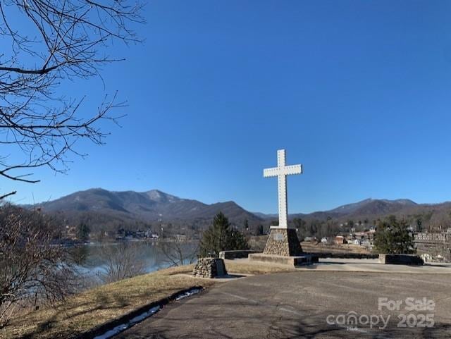 view of mountain feature with a water view