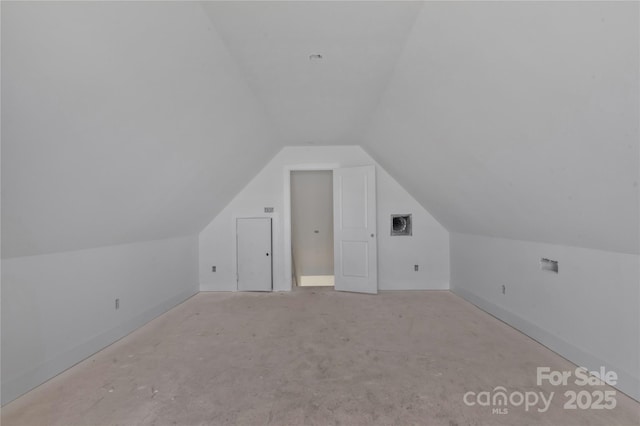 additional living space with lofted ceiling