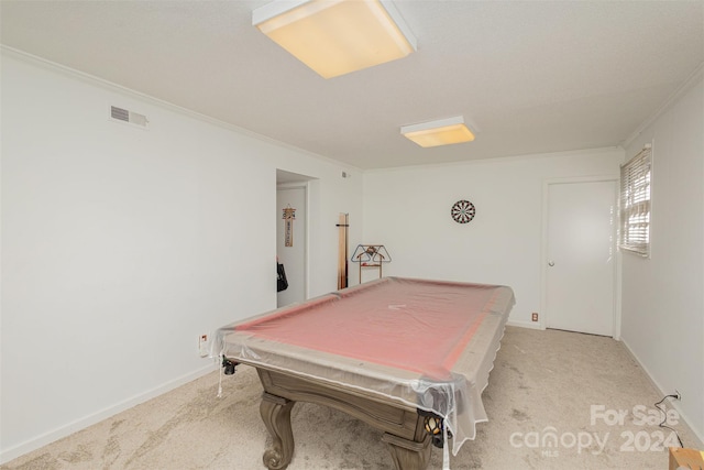 rec room featuring pool table, ornamental molding, and light carpet