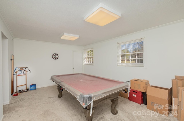 recreation room with crown molding, light colored carpet, and billiards