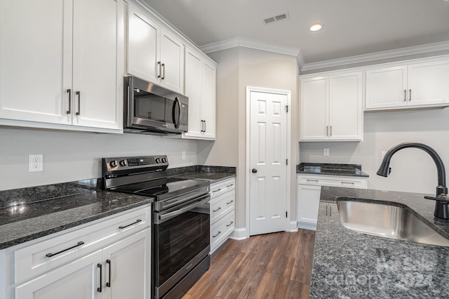 kitchen with white cabinetry, sink, stainless steel appliances, dark hardwood / wood-style flooring, and crown molding