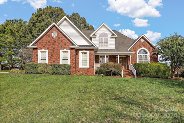 view of property with a front lawn