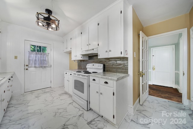 kitchen with white cabinetry, white electric range, and tasteful backsplash