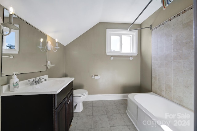 bathroom with vanity, vaulted ceiling, a bath, tile patterned flooring, and toilet