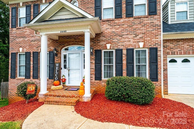 property entrance with a garage