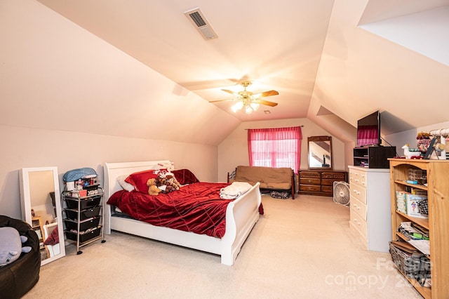 carpeted bedroom with ceiling fan and lofted ceiling