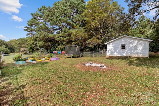 view of yard with a trampoline