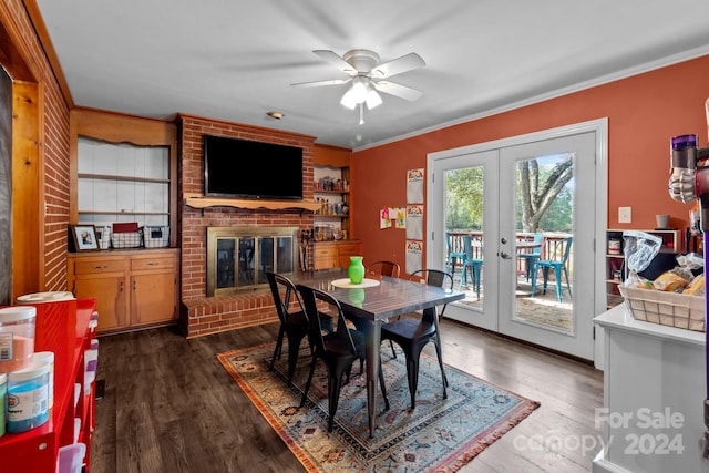 dining area with crown molding, dark hardwood / wood-style floors, and french doors