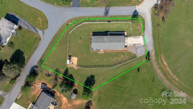 birds eye view of property featuring a rural view