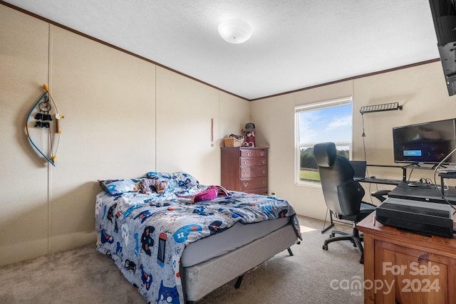 bedroom featuring light colored carpet, a textured ceiling, and crown molding