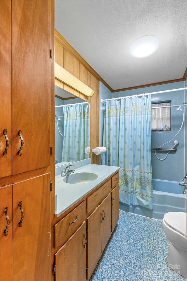 full bathroom featuring vanity, a textured ceiling, shower / tub combo, crown molding, and toilet