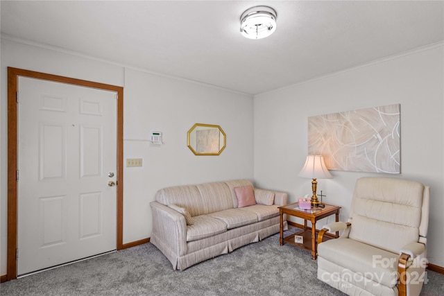 carpeted living room with ornamental molding