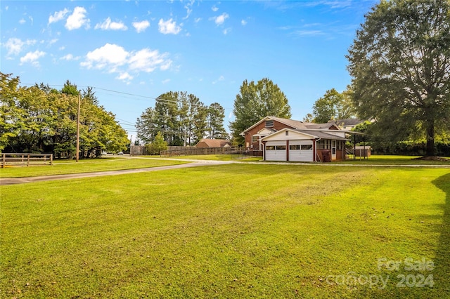 view of yard featuring a garage