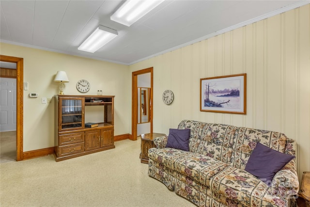 carpeted living room featuring crown molding