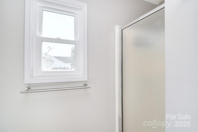 bathroom featuring a stall shower