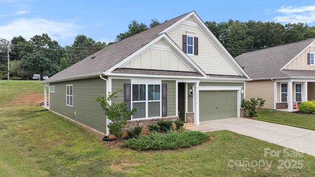 craftsman-style house featuring a garage and a front lawn