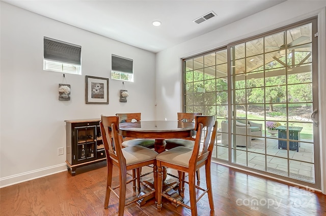 dining room with hardwood / wood-style floors