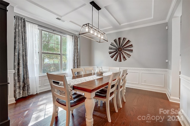 dining area featuring crown molding and dark hardwood / wood-style flooring