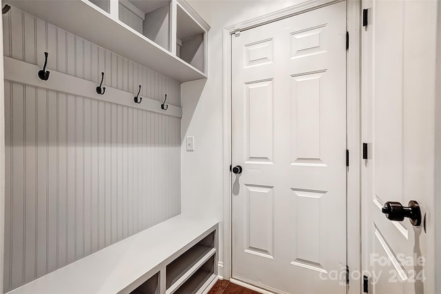 mudroom with dark hardwood / wood-style floors