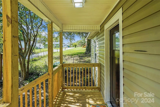 wooden terrace with covered porch