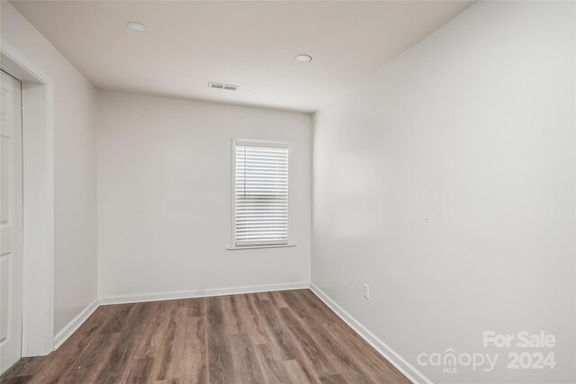 empty room featuring hardwood / wood-style floors