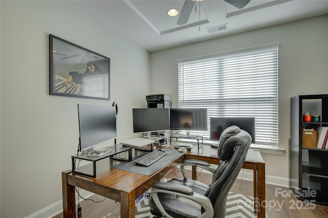 office featuring ceiling fan and wood-type flooring