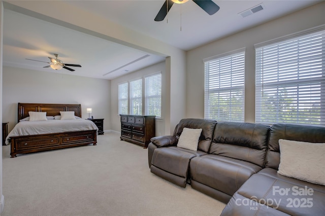 carpeted bedroom with ceiling fan