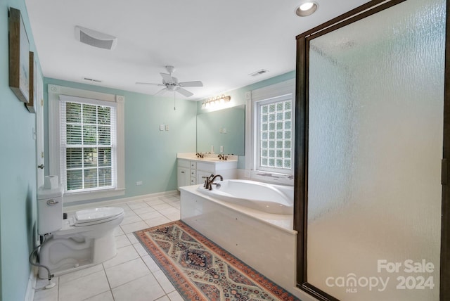 full bathroom with ceiling fan, vanity, toilet, separate shower and tub, and tile patterned flooring