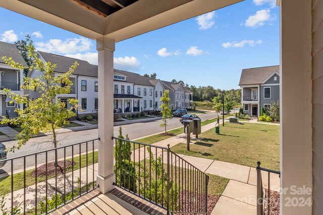 10193 Meeting House Dr NW, Huntersville, NC 28078 - balcony with a residential view and a porch